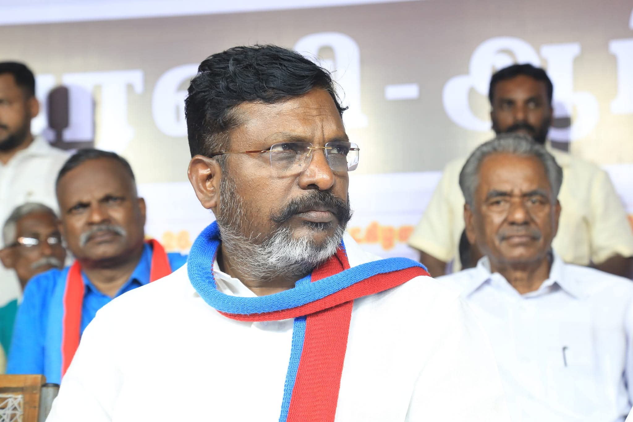 Party leader with supporters