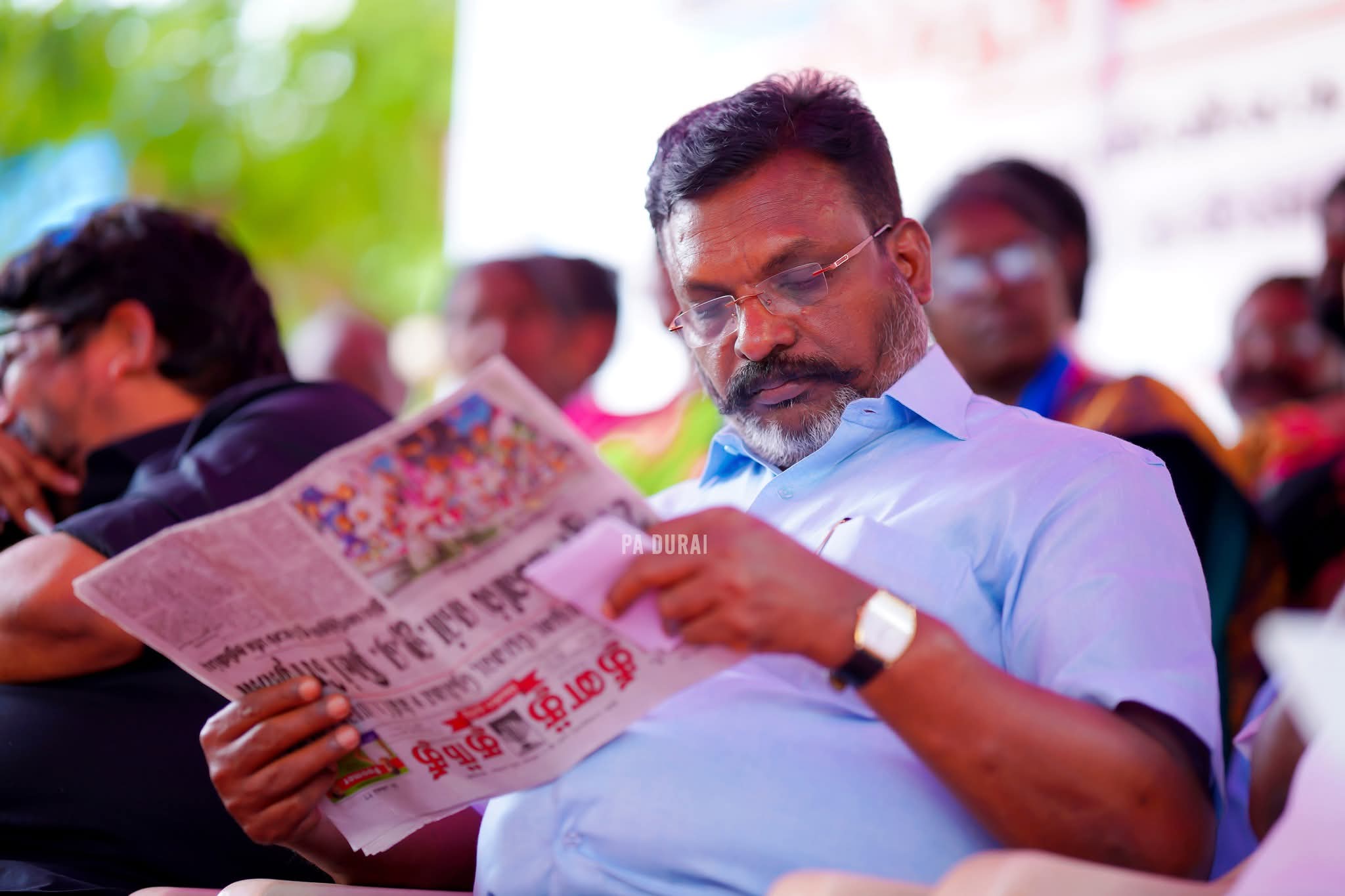 Reading newspaper